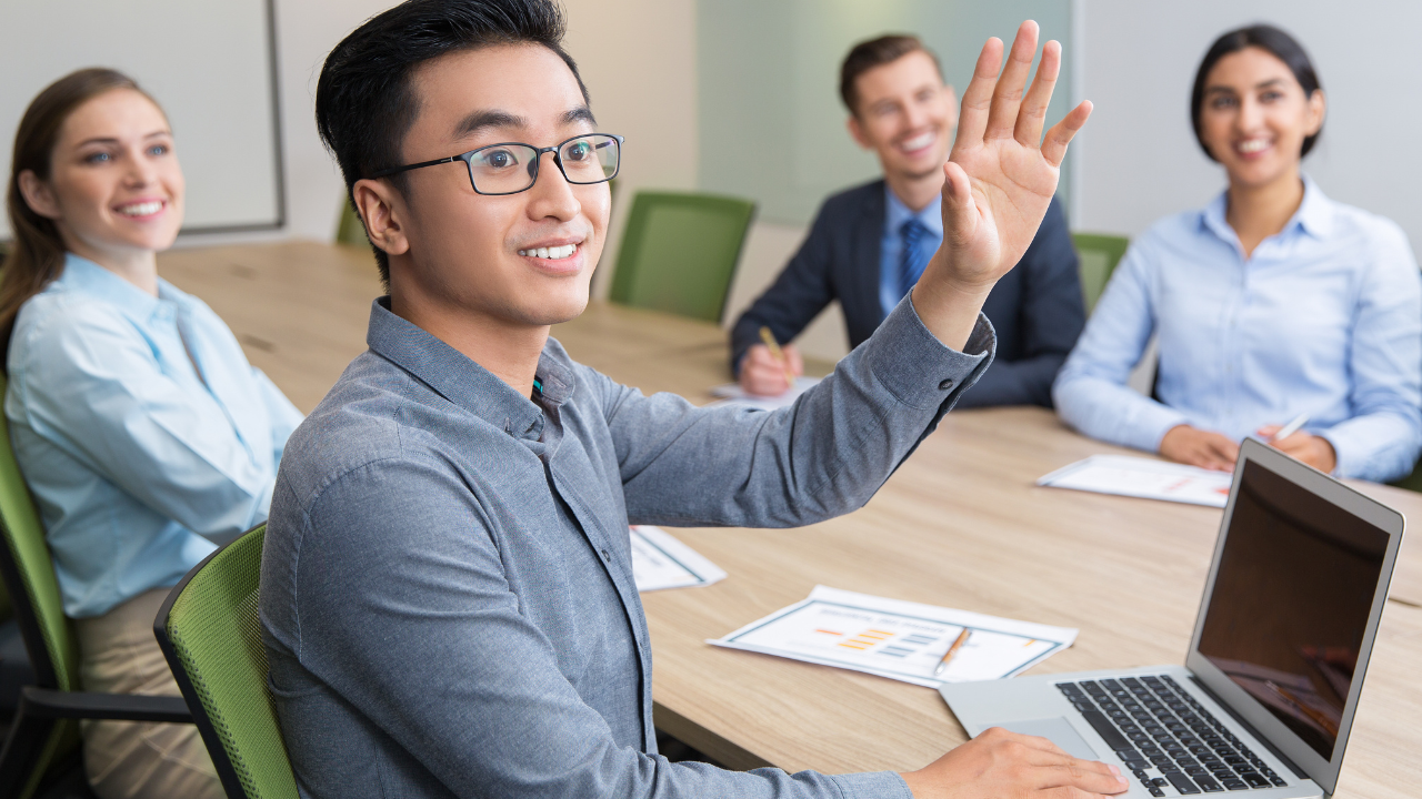 Man taking accountability for a project in a meeting